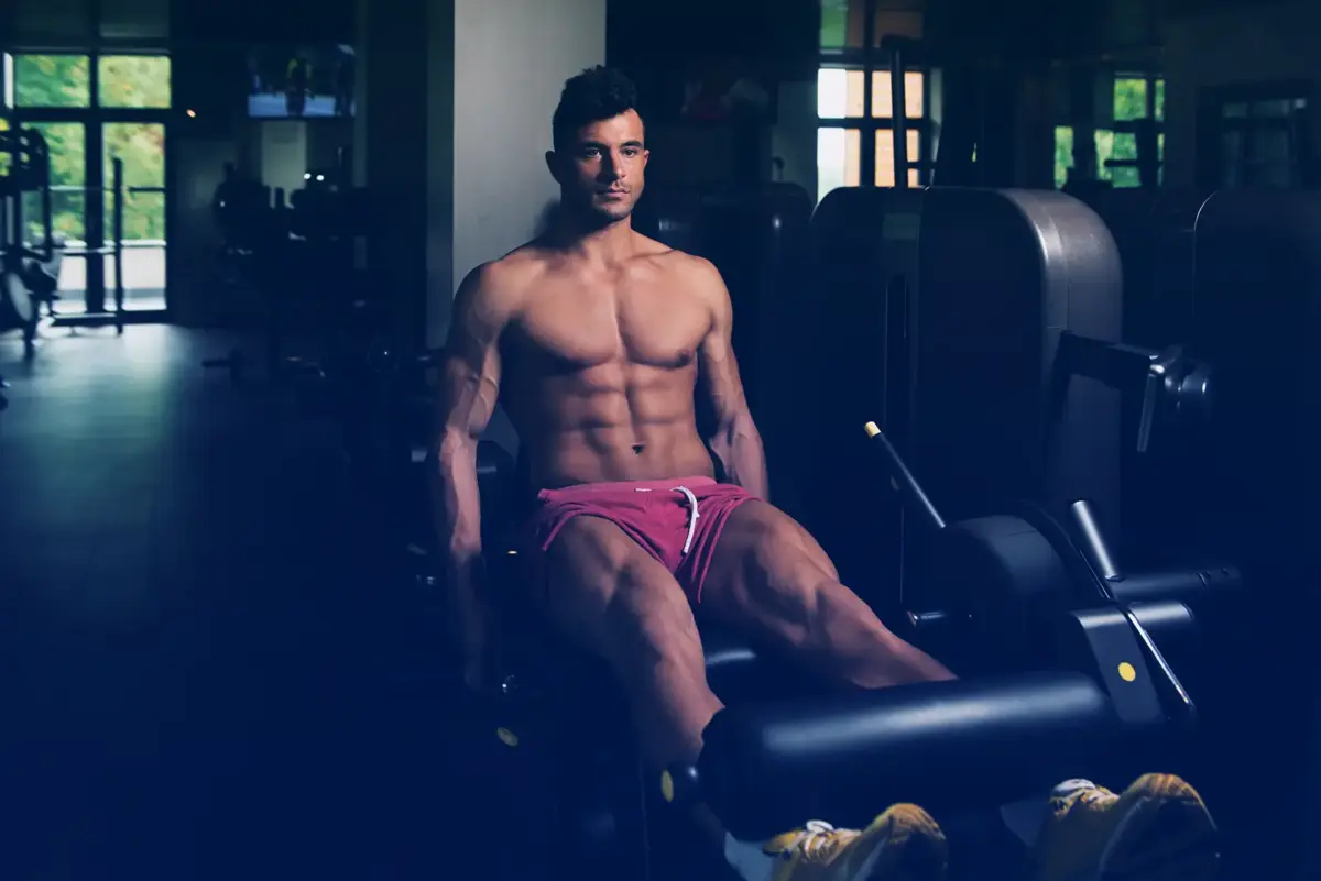 man doing leg extension