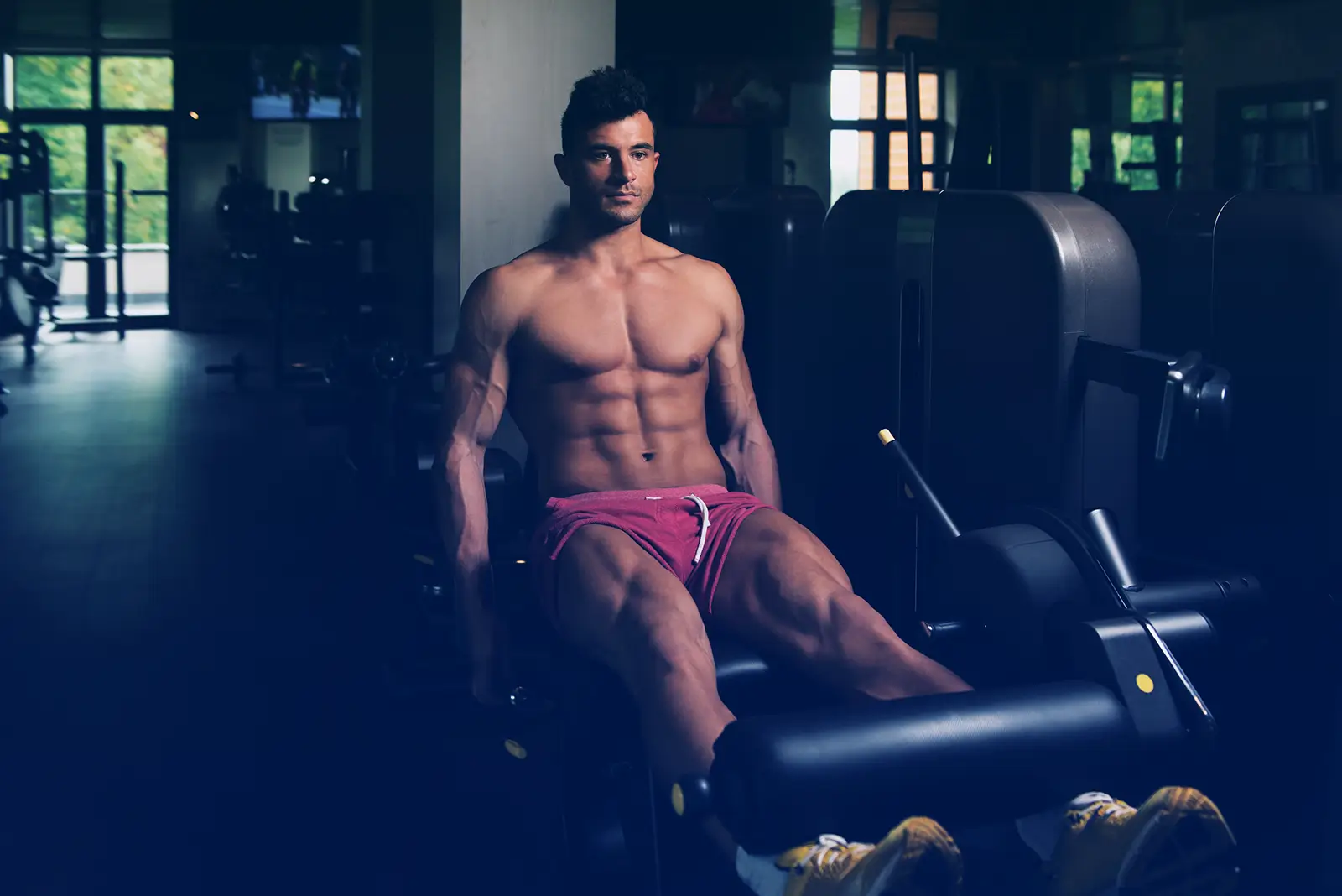 man doing leg extension