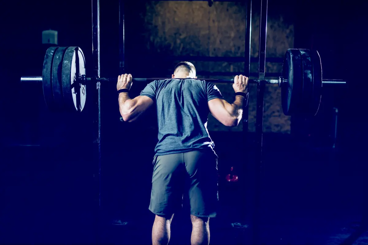 man about to back squat