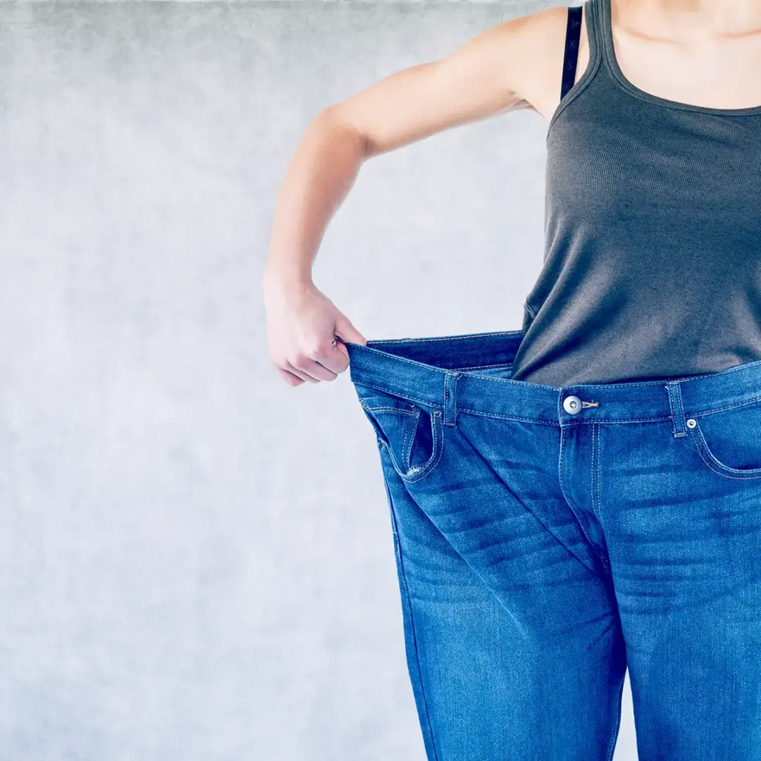 woman showing weight loss