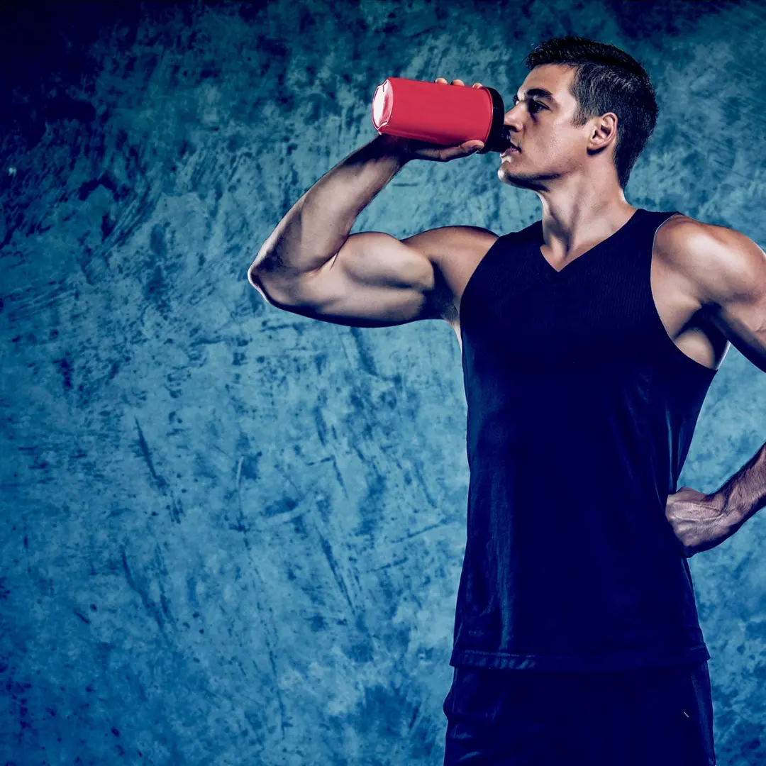 man drinking protein shake