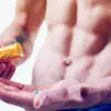 shirtless man taking NSAIDs