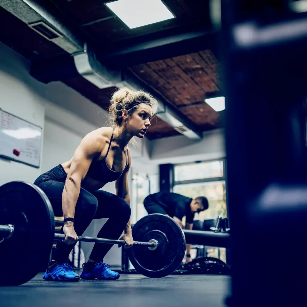 woman doing deadlifts