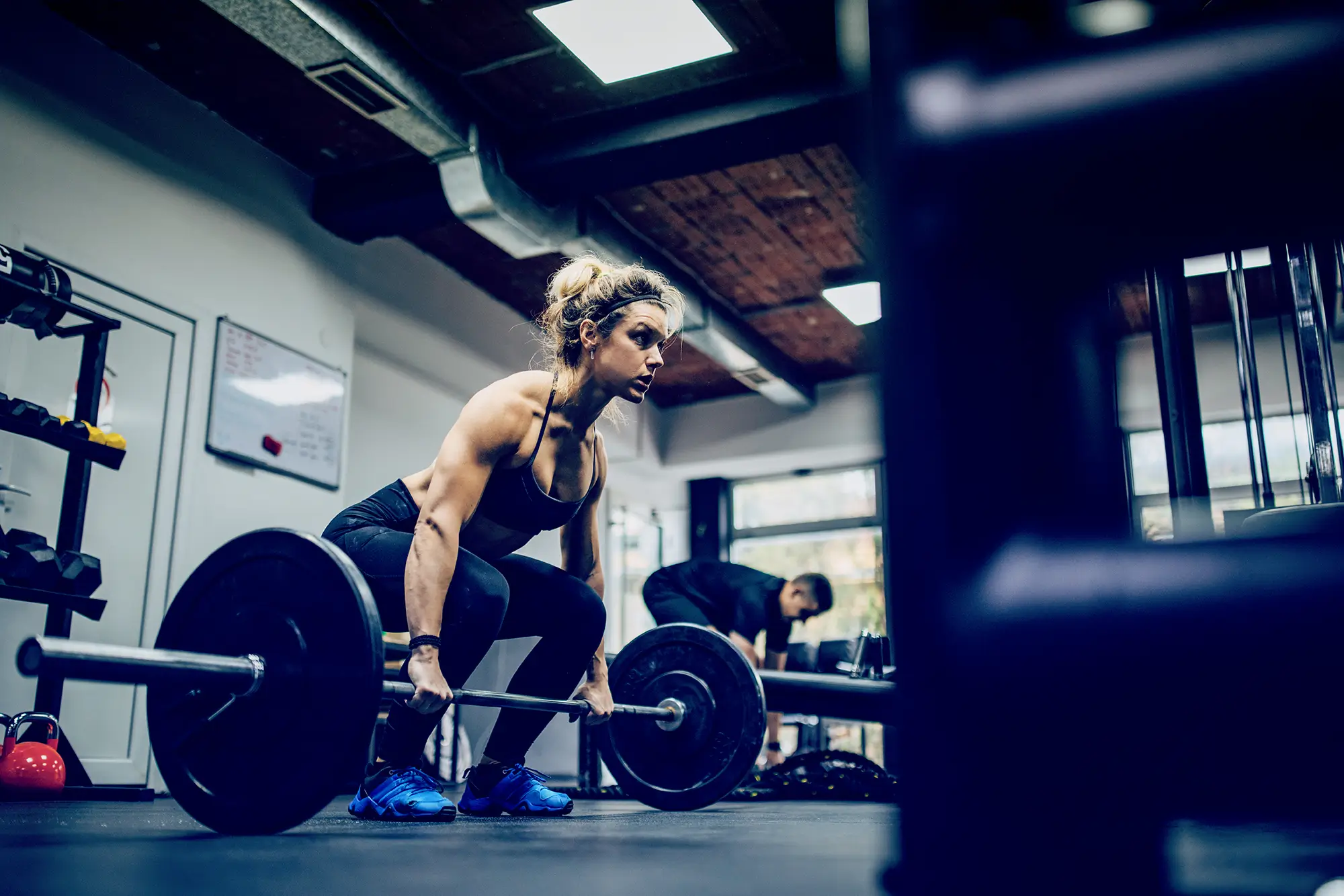 woman doing deadlifts