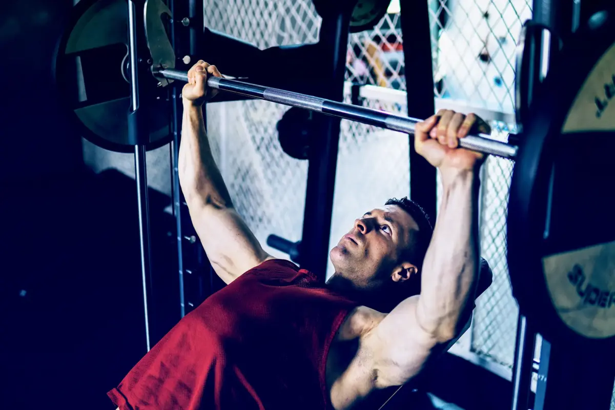man incline bench pressing