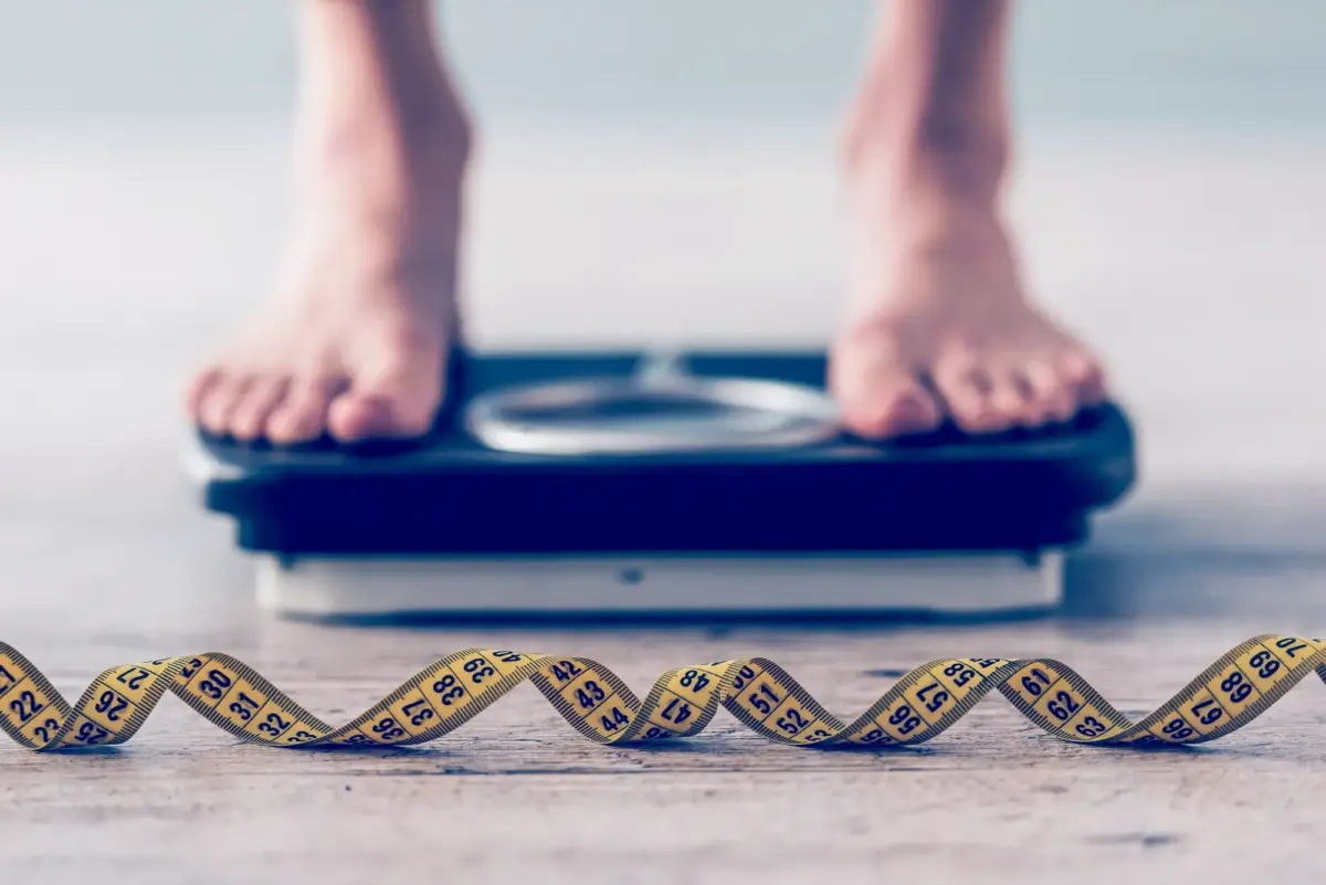 someone standing on a scale