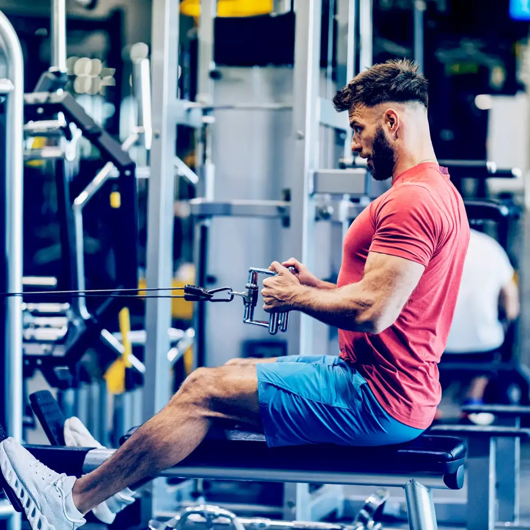 man doing seated rows