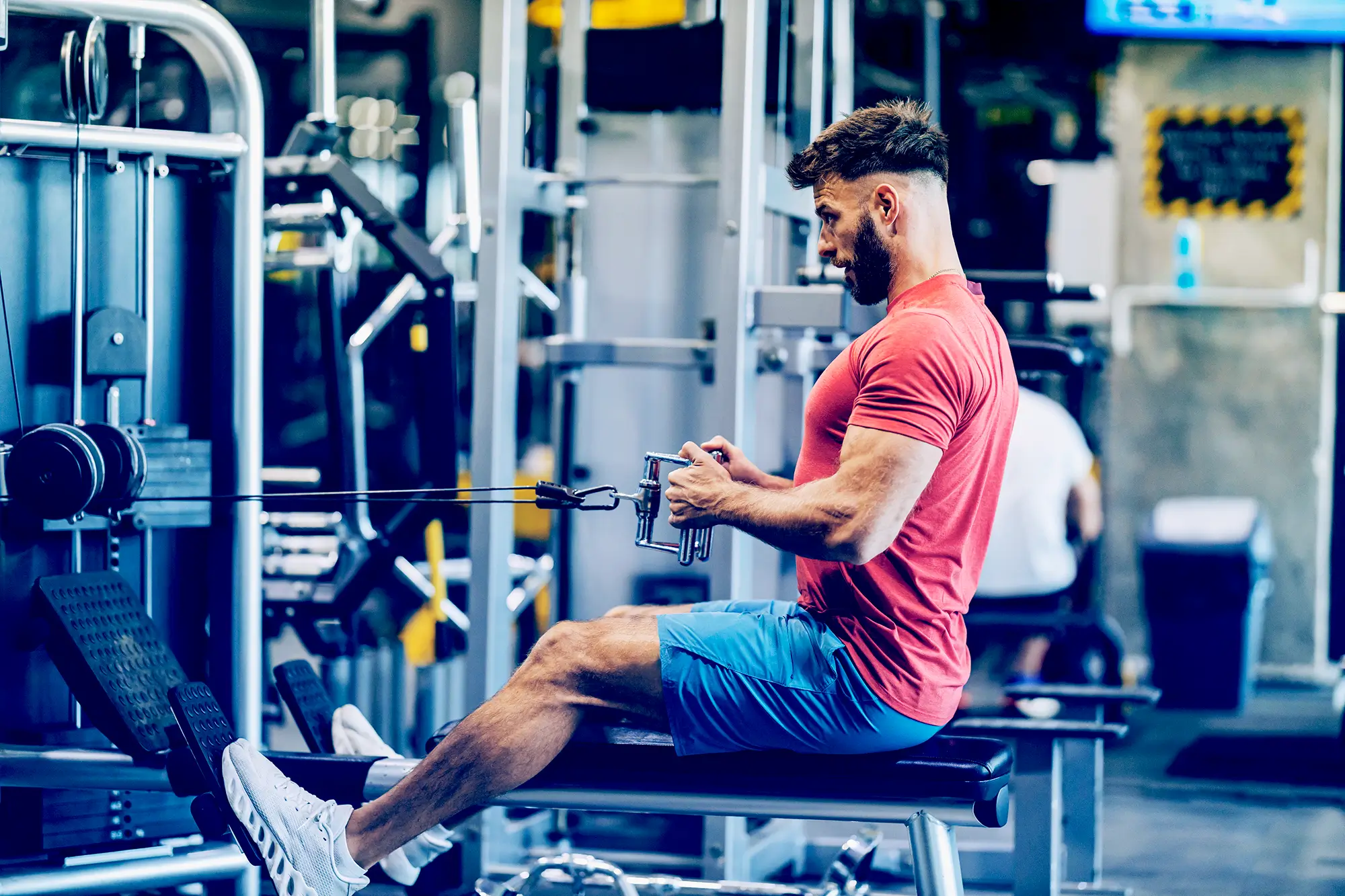 man doing seated rows