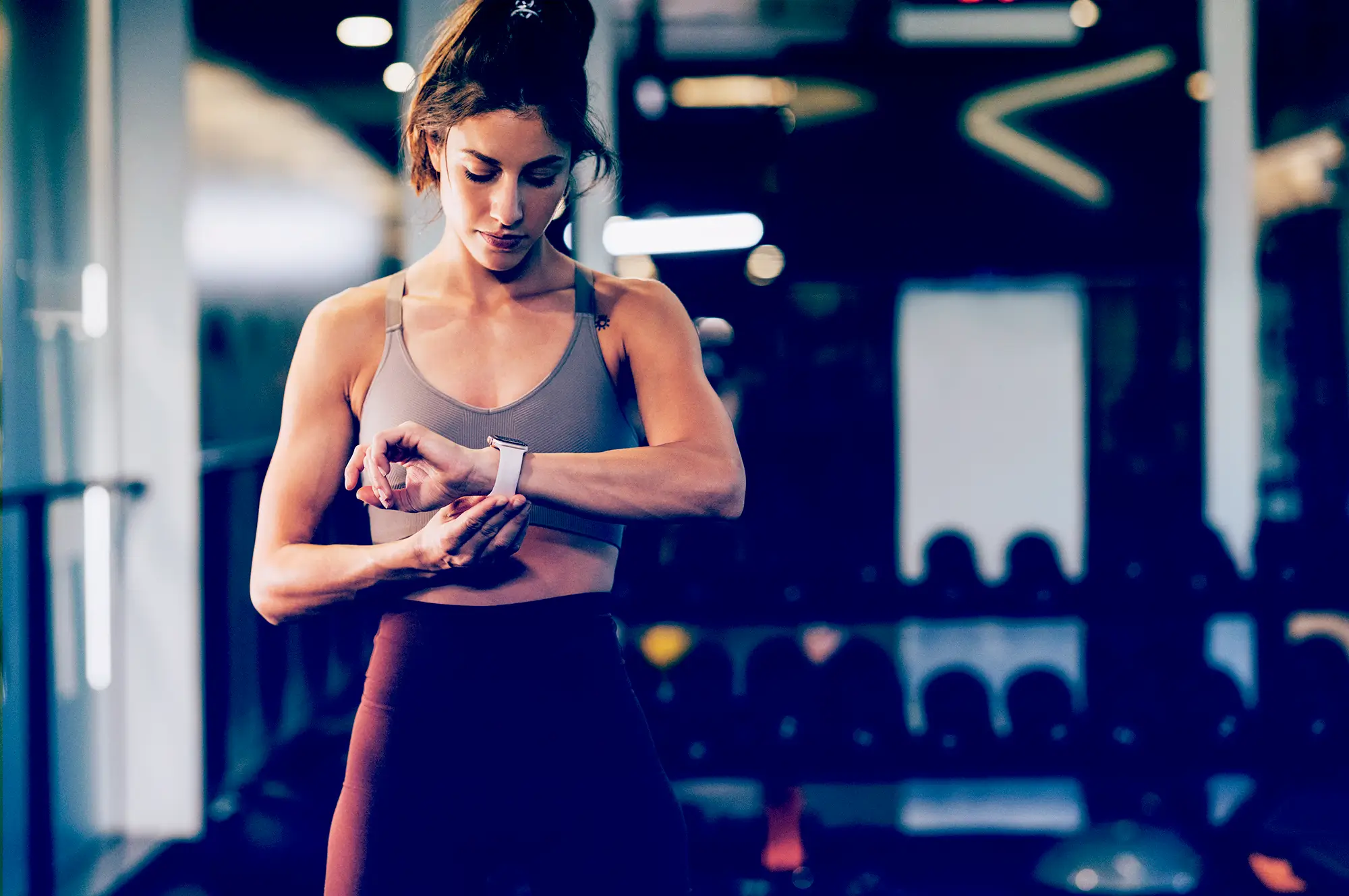 woman checking her smartwatch