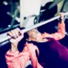 elderly woman doing machine press