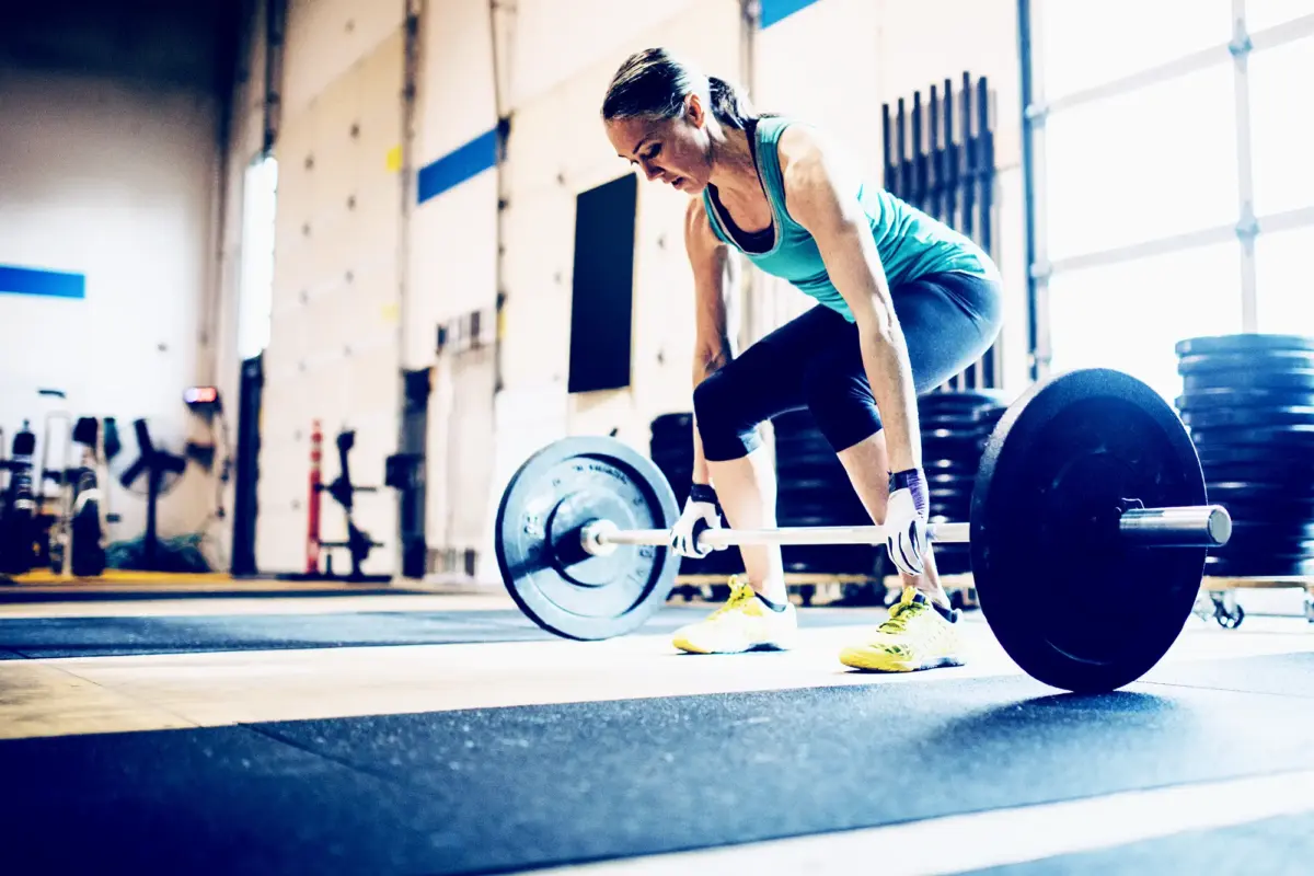 mature woman deadlifting