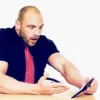 man using a calculator
