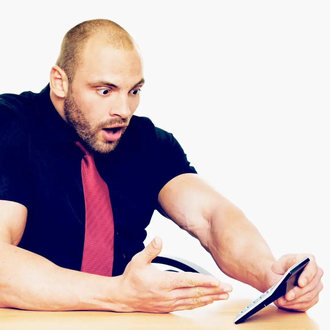 man using a calculator